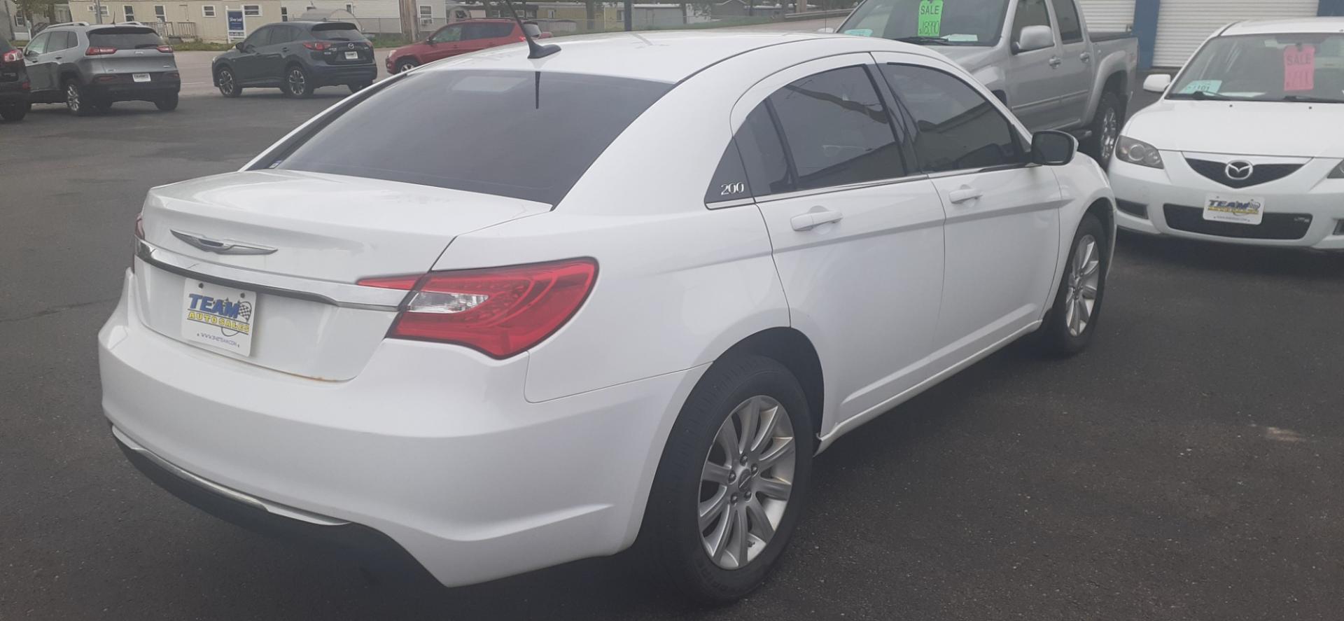 2012 Chrysler 200 Touring (1C3CCBBB9CN) with an 2.4L L4 DOHC 16V engine, 6-Speed Automatic transmission, located at 2015 Cambell Street, Rapid City, SD, 57701, (605) 342-8326, 44.066433, -103.191772 - CARFAX AVAILABLE - Photo#3